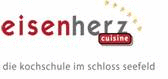 Logo der Firma Kochschule "eisenherz cuisine" im Schloss Seefeld®