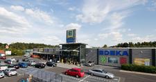 PATRIZIA erwirbt Immobilienportfolio mit 21 Fachmarktzentren
