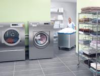 Miele-Stand mit Wäscherei im Live-Betrieb: Modernste Technik auf 140 Quadratmetern