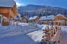 Trattlers Hof-Chalets gewinnen den HolidayCheck Award 2020