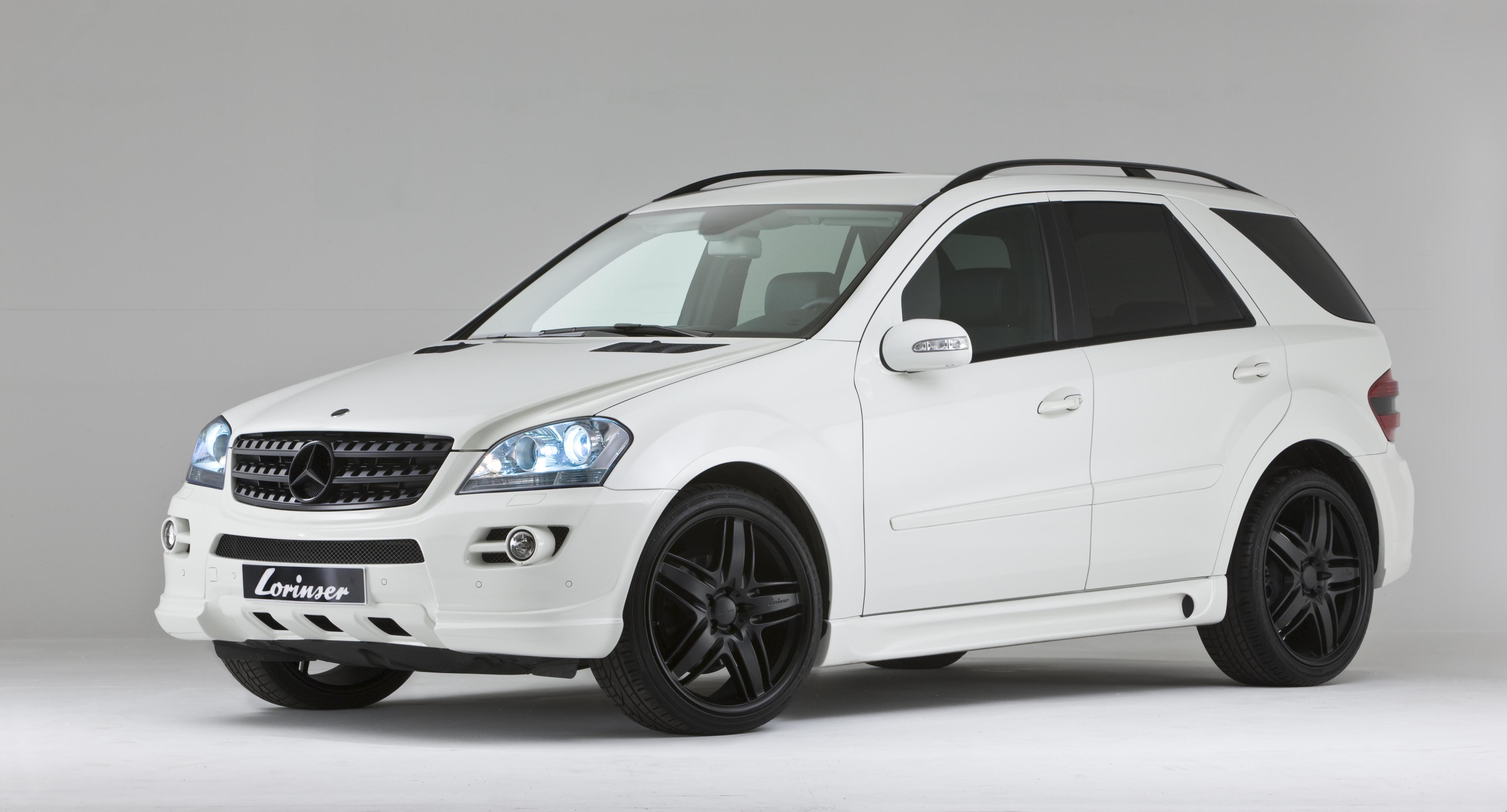 Мл белый. Mercedes-Benz ml 320 белый. Mercedes Benz ml w164 AMG белый. Mercedes ml 164. Mercedes ml w164 обвес.