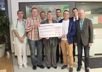 v.l.n.r.: Dr. Alfred Leipold, Christian Richling, Anton Stüber, Gudrun Schütte, Rainer Haßfeld, Matthias Beyer, Detlev Huge, Bernd Schmarbeck. (Bildquelle: P. Geiger, Städtisches Klinikum Karlsruhe)