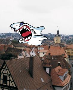 Der „Dach-Hai“ ist zur Symbolfigur für maßlos gierige und skrupellose Dachhandwerker geworden, denen schnelles Geld vor guter Arbeit geht