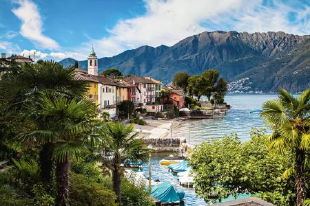 Schweiz. ganz natuerlich..Kleiner Hafen mit farbiger Haeuserzeile am Lago Maggiore, Gerra (Gambarogno)...Switzerland. get natural. .Small harbor with colorful row of houses on Lake Maggiore, Gerra (Gambarogno) / Copyright by: Switzerland Tourism - By-Line: swiss-image.ch/Jan Geerk