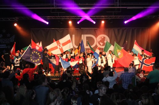 Dancers waving the flags of Europe at the UDO European Championships 2017.JPG
