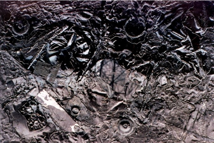 Janos Nadasdy_Die Schattenseite des Mondes_1995_Diverse Gegenstaende in Bitumen_100x140 cm.JPG