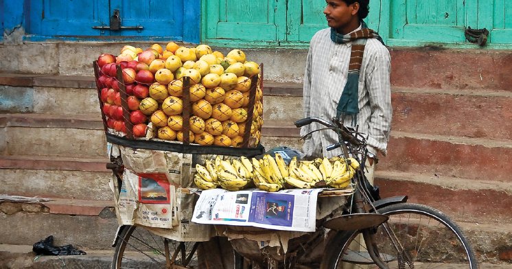 Intrepid Travel-india_local-seller_bike_credit Hamish Cattell.jpg