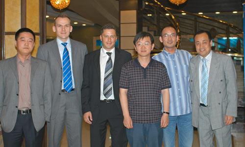 The photo shows (l-r): KBA China's Zhao Lin and Andreas Friedrich, KBA Asia-Pacific managing director Stefan Segger, Zhejiang Daily project manager Cai Ru Song and technical director Du Pionjiang, and KBA China's Han Shao Sheng (9)