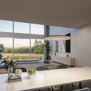 Das Lighting Pad Lounge verströmt stimmiges Licht über einem Esstisch. Aus dieser Perspektive ist die Variante Classic Oak mit Grey dawn zu sehen, eine von insgesamt vier definierten Kombinationen. Design: Dietrich F. Brennenstuhl, Foto: DesignRaum
