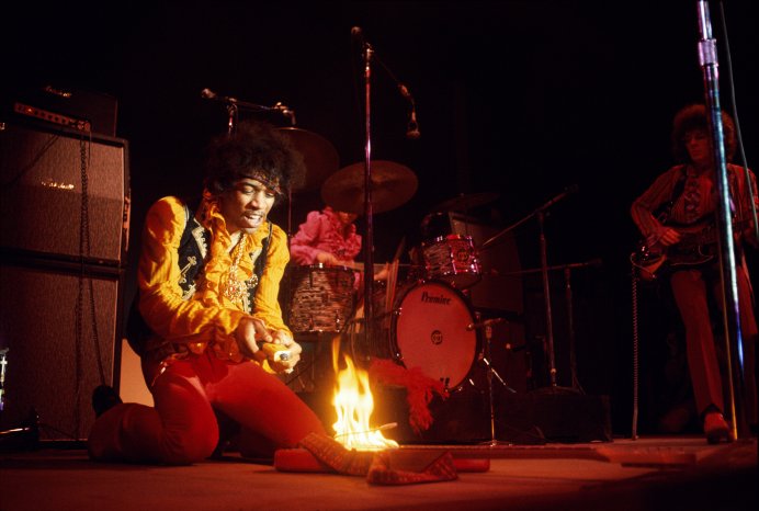 Jimi Hendrix lighting his guitar on fire on stage at Monterey International Pop Festival, M.jpg