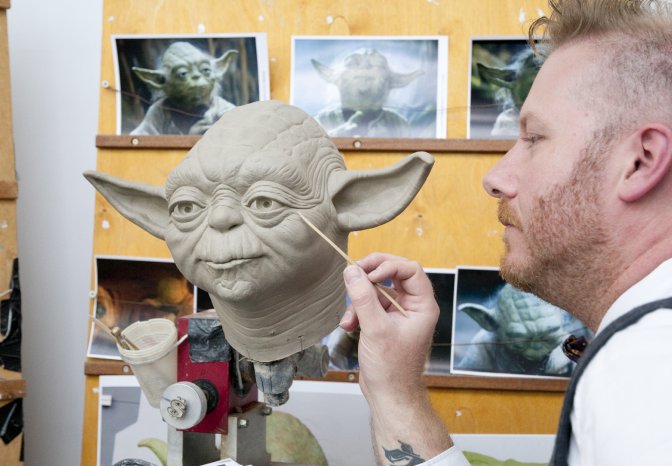 An amazingly accurate clay sculpt of Jedi Master Yoda is worked on by Madame Tussauds sculptor B.JPG