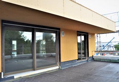 Holzbau auf Beton: Beim BV Freistil in Schwabing hat Züblin Timber auf die vier Betonbaukörper jeweils ein Penthouse in Holzrahmenbauart gesetzt, dessen Fassade ein natürliches INTHERMO Holzfaser-WDVS ummantelt. Foto: Achim Zielke für INTHERMO, Ober-Ramstadt; www.inthermo.de