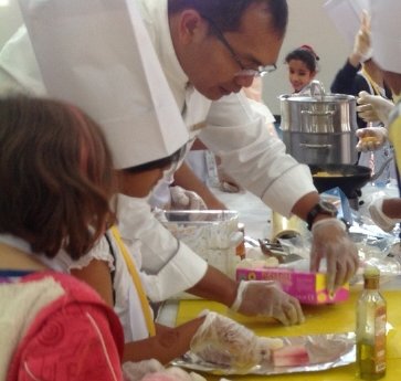 Ras Al Khaimah TDA children cooking at diabetes event - 1 -.jpg