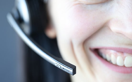 smiling-woman-with-microphone-professions-remote-work-as-operator-call-center.jpg
