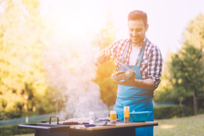 shutterstock_young man BBQ_444210304.jpg