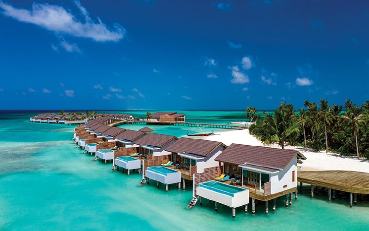 ATMOSPHERE KANIFUSHI MALDIVES - AERIAL VIEW - WATER VILLA JETTY 03.jpg